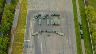 Военные в Воронежской области выстроили большегрузами число 110 в честь юбилея