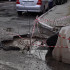 Мусоровоз провалился под асфальт на улице Хользунова в Воронеже