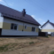 Появились фото домов в Петропавловке, построенных вместо повреждённых при сходе боеприпаса